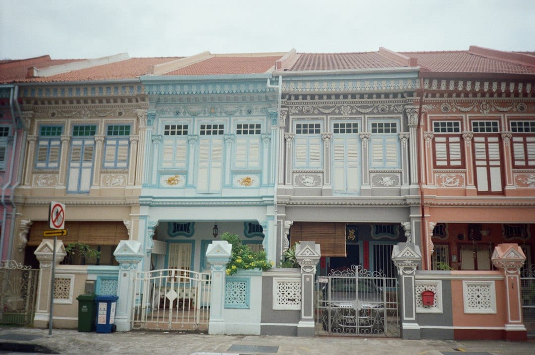 Row of colourful traditional terrace houses in Telok Kurau